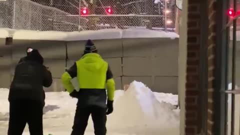 ANTIFA/BLM block police with SNOW