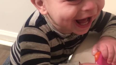 Baby Laughs At Rubber Ducky