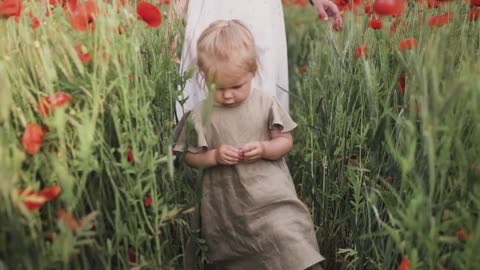 Little Babygirl walks thru the fields