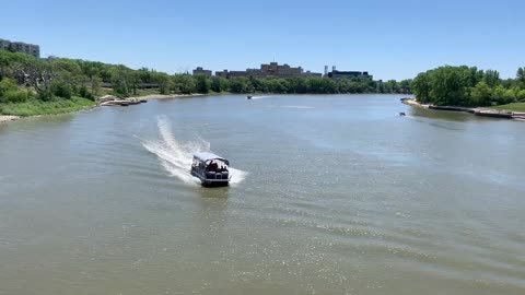 Motor boat rides on Red River. Winnipeg, Canada