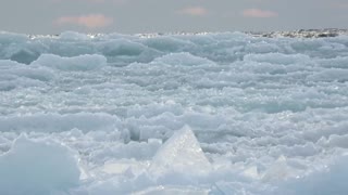 Waves of ice cover frozen surface of Lake Superior