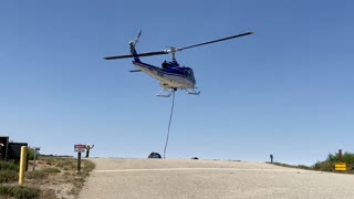 Helicopter 554 lifts cargo at Keenwild Helibase