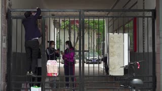Beijing tightens COVID restrictions