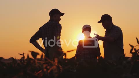 A Group Of Farmers In The Field Shaking Hands Family Agribusiness Team Work In Agribusiness