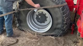 Tractor's Flat Tire Fixed With Fire