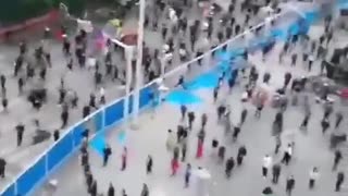 Wuhan, China, now people smash down fences