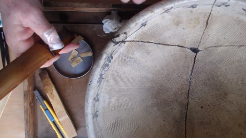 Traditional, lacquer based kintsugi, fine tuning sabi on mortar
