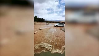 Water floods Oman streets after heavy rain