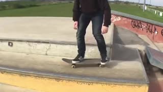 Skateboard head hits bueno ledge