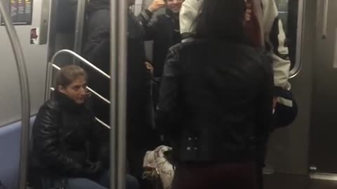 Man smacks the SOUL out of girl on the NY Subway