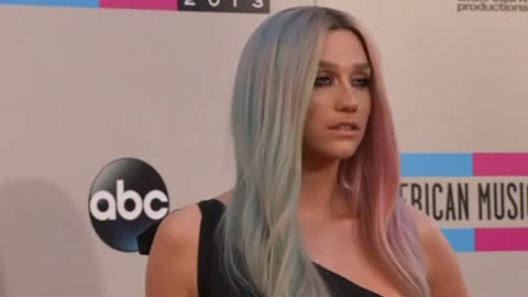 Kesha sues producer Dr. Luke, Witherspoon premieres 'Wild'