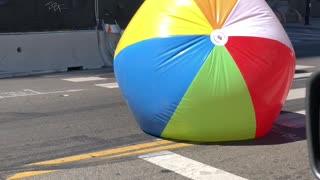 Giant Beach Ball Rolling By