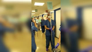 Masked Medics Host Easter Parade In Spain Hospital