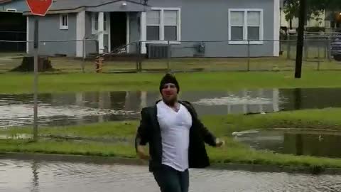 Man Makes Most Of Flooding By Taking To Street For Usher Parody Video Part 2