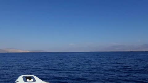 Red Sea walking on a speedboat