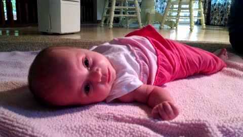 6-week-old baby rolls over for first time