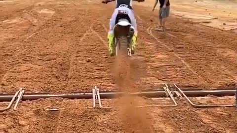 Flying dirt directly into the camera from a motorcycle