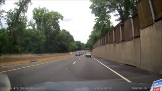 Runaway Tire Smashes Into Oncoming Traffic