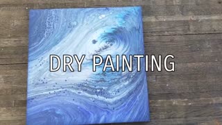 Acrylic pouring tree ring technique on wood
