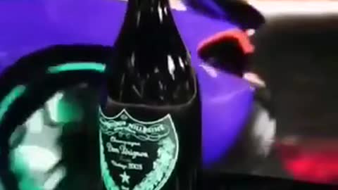 Opening a bottle of wine with a car