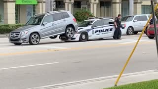 Cop Car Stuck Underneath SUV After Collision