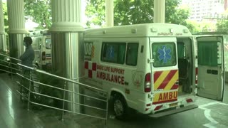 Indian hospital treats COVID patients in ambulances