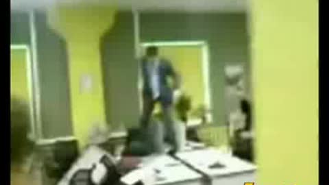 Better Footage of the Man Going Berserk in an Office