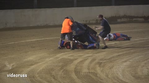 Sidecar Tumbles during Speedway Race