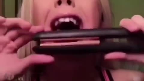 Vibes blonde girl hair straightener tongue