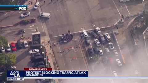 A group of pro-Palestine protesters are blocking traffic outside LAX