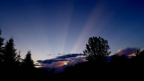 Rare sunlight rays streak across entire sky
