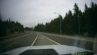 Rogue Trailer Tire Crosses Center Median on Highway