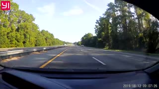 Runaway Truck Tires Roll Down Interstate