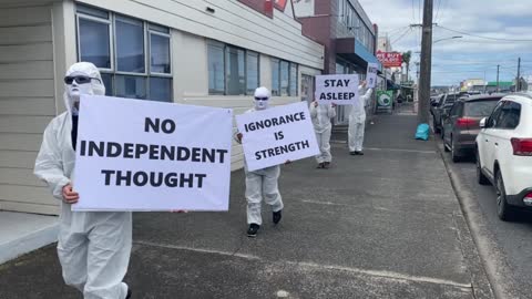 White Suit march with signs