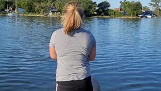 My wife catches a bass