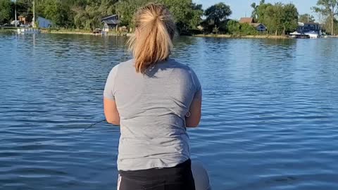 My wife catches a bass