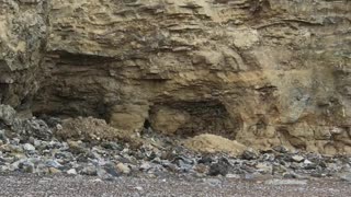 Large Cliff Face Crumbles onto Beach