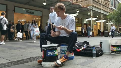 street drummer - just one bucket