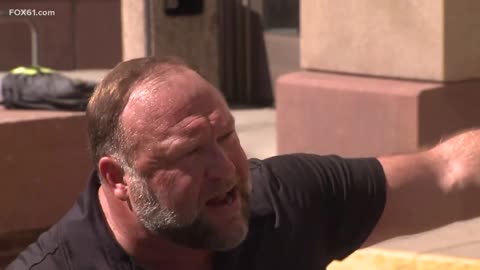 Alex Jones rant on trial on courthouse steps, announces bankruptcy
