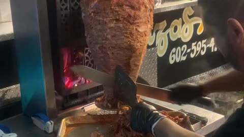 Have You Ever Watched A Chef Cut Some Al Pastor For Your Tacos?