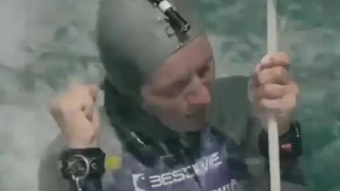 he Slovenian broke world records by diving 122 metres, using no oxygen equipment.