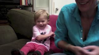 Cute baby using sign language