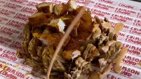 How much would you pay for this blooming onion loaded w Mac and hot chicken from