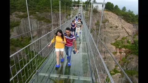 Scary glass bridge opens in China