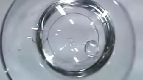Water Droplets in a Bubble in a Sphere