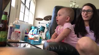 Baby sees her reflection, screams in excitement