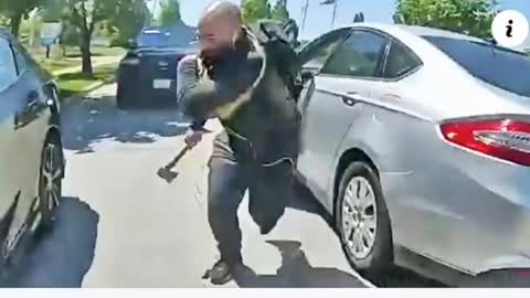 Car randomly pulls up next to a cop, driver jumps out with an axe