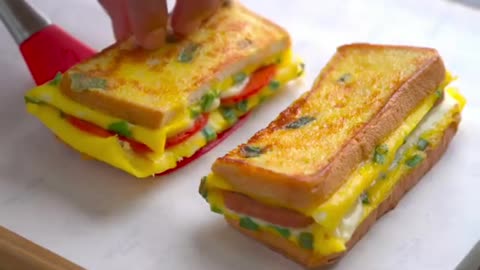 "Epic Eggstravaganza: The Ultimate Breakfast Bliss - Mouthwatering Egg Sandwich Delight!"