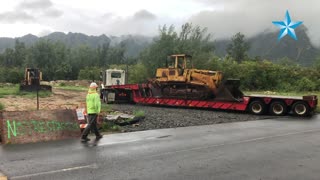 City contractor removes vandalized bulldozer at Sherwood Forest