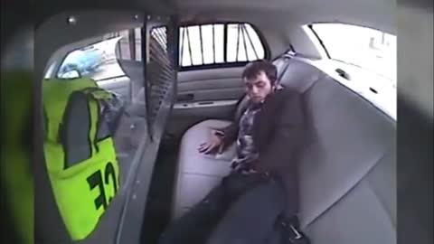 Guy gets ejected from cop car HILARIOUS MUST WATCH VIDEO
